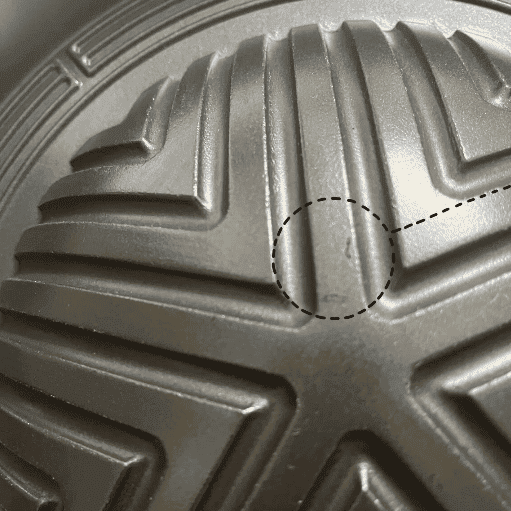 damaged nonstick cookware peeling surface close up