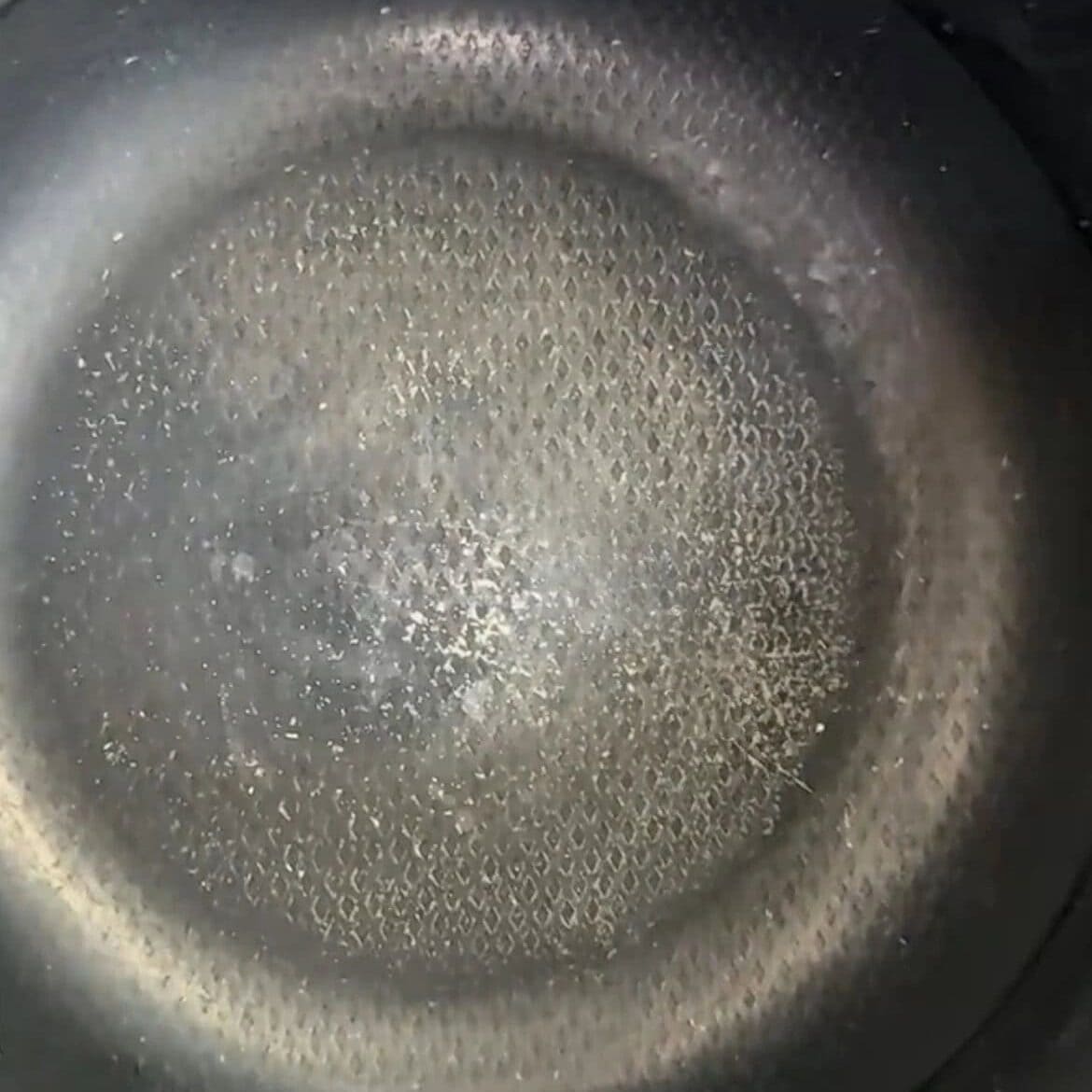 scratched nonstick coating cookware close up