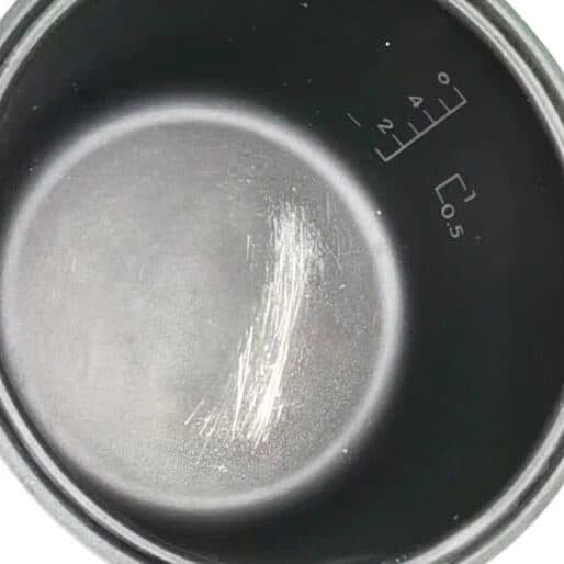 scratched nonstick coating cookware close up